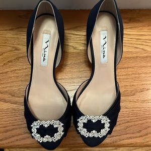 Navy satin shoe with decorative crystal buckle